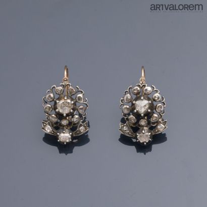 Pair of yellow gold and silver dormeuses...