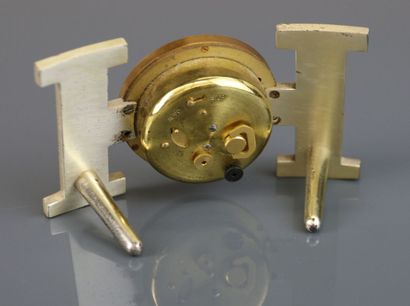 HERMÈS Paris
Brushed gilt metal clock in...