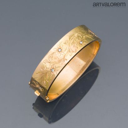 Ribbon bracelet in yellow gold 750°/°° with...