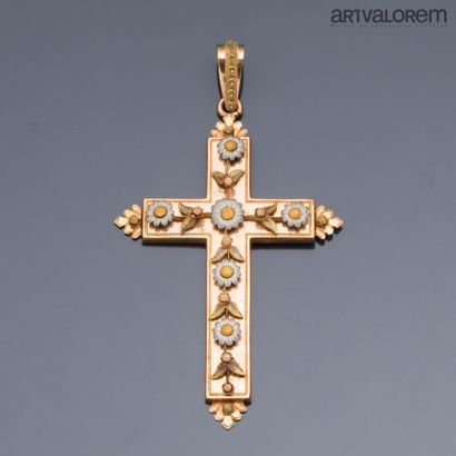 Latin cross in yellow and white gold 750°/°°...