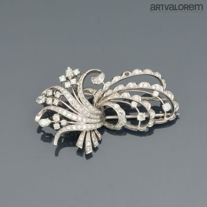 750°/°° white gold lapel clip in the form...