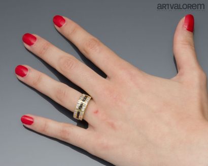 Yellow gold 750°/°° ring set with three rows...