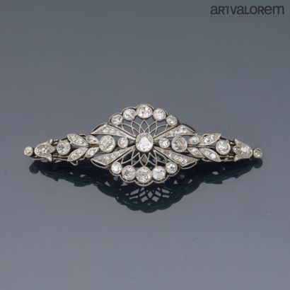 Platinum brooch in the form of an openwork...