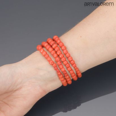 Bracelet with four rows of faceted coral...