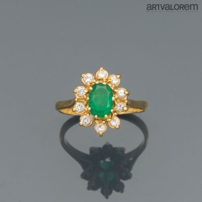 Ring in yellow gold 750°/°° centered on an...