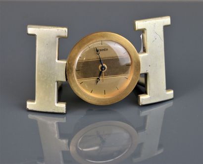 HERMÈS Paris
Brushed gilt metal clock in...
