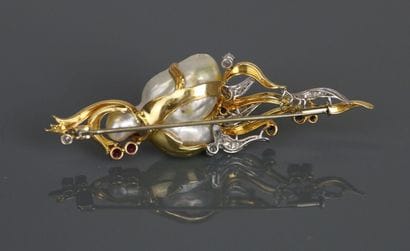 Brooch in yellow and white gold 750°/°°,...