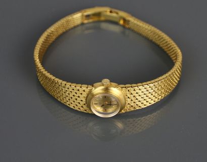 OMEGA
Montre de dame en or jaune 750°/°°,...