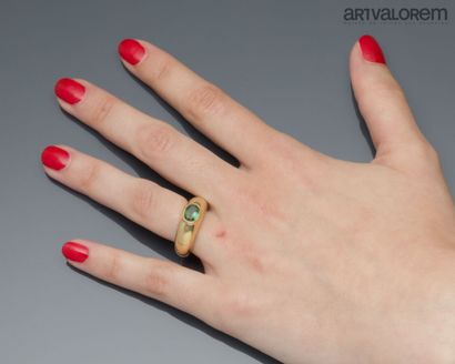 Ring in yellow gold 750°/°° centered with...