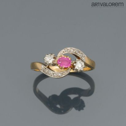 Yellow and white gold 750°/°° ring centered...