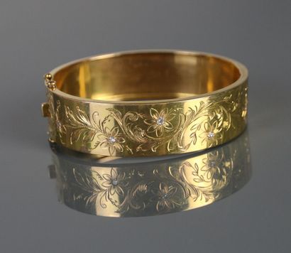 Ribbon bracelet in yellow gold 750°/°° with...
