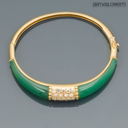 750°/°° yellow gold open-worked bangle set...