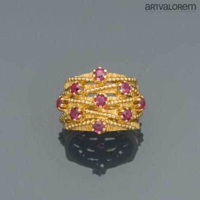 Band ring in yellow gold 750°/°° formed of...