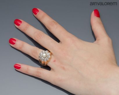 Ring in 750°/°° yellow gold and platinum...