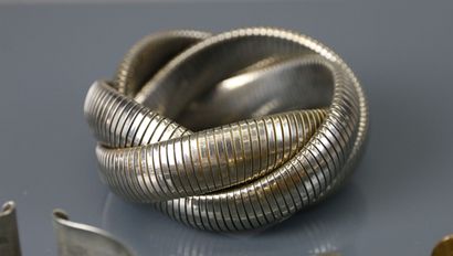 Lot of costume jewelry including metal bangle...