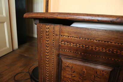 Large chestnut chest with four panels inlaid...