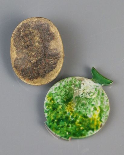 Lava stone medallion with carved decoration...