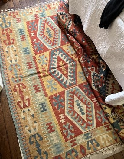 Three Kilim rugs in wool with geometric motifs.
115...