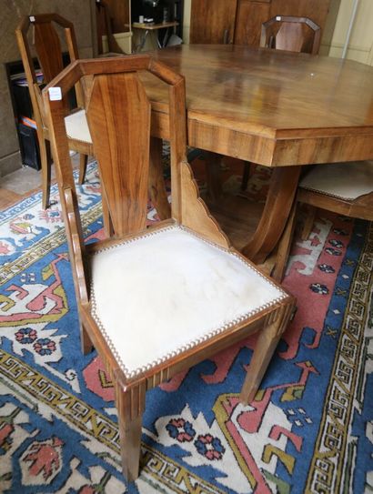 Set comprising an octagonal dining table...