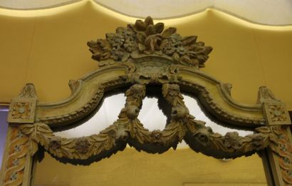 Lacquered wood mirror decorated with a floral...