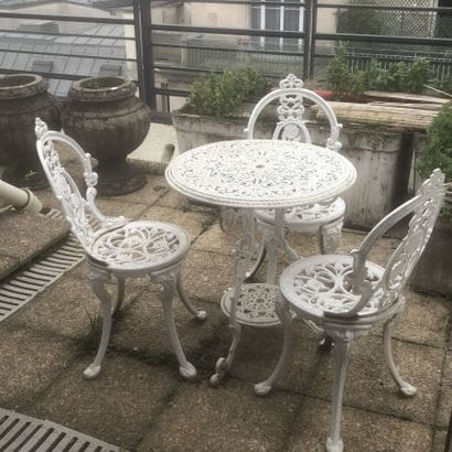 Garden furniture including a table and 3...