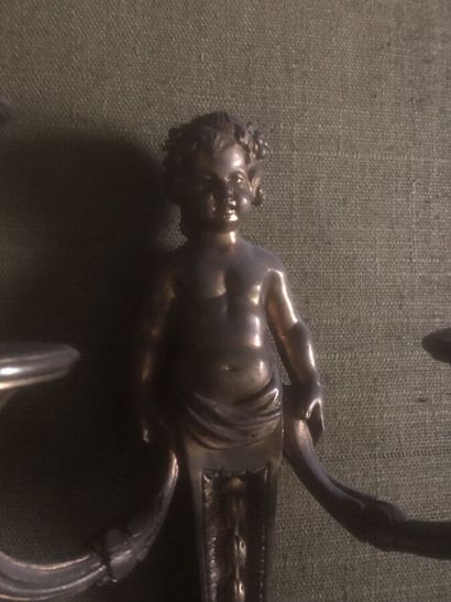 Pair of ormolu sconces decorated with putti...