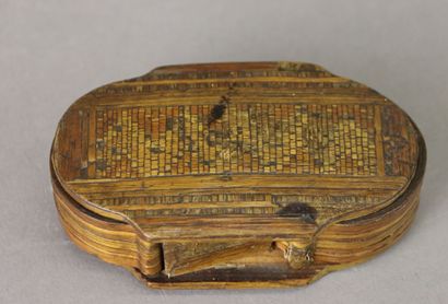A straw marquetry two-compartment pill box,...