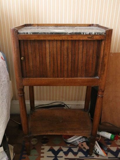 Walnut bedside cabinet with shutters, the...