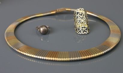 Lot of costume jewelry including metal bangle...