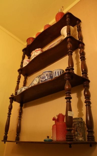 A mahogany and mahogany veneer display cabinet...
