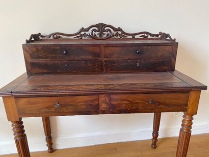 Mahogany-veneered desk with four drawers,...