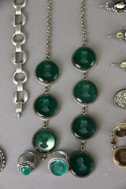 Costume jewelry set including a pair of earrings,...
