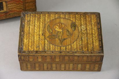 A polychrome straw marquetry box with a stepped...