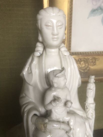 CHINA, 20th century
Guanyin with child in...