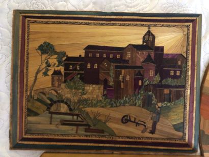 A covered straw marquetry box in the shape...