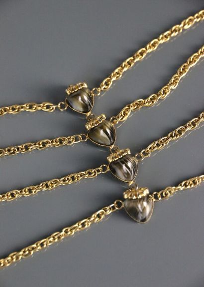 Gilded metal drapery necklace with four rows...