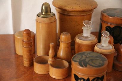Nine boxwood boxes, two of which are painted...