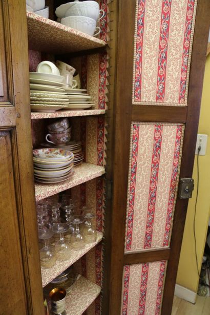Molded walnut cabinet opening with two doors.
H:...