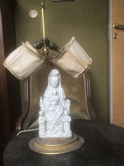 CHINA, 20th century
Guanyin in white porcelain,...