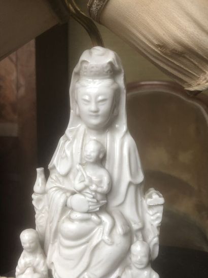 CHINA, 20th century
Guanyin in white porcelain,...