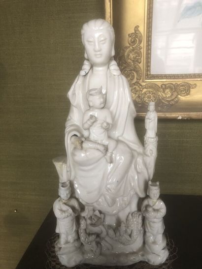 CHINA, 20th century
Guanyin with child in...