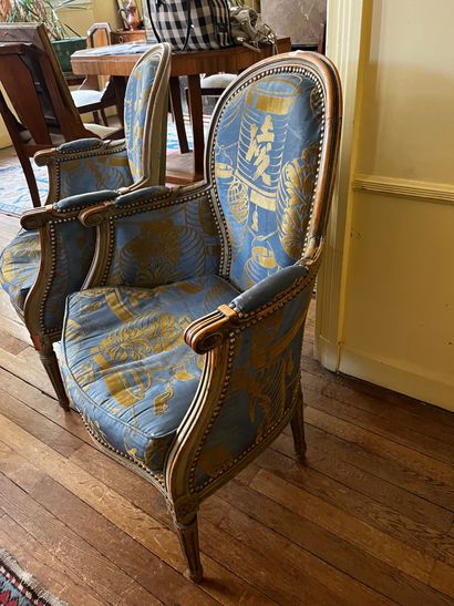 Pair of bergères in grey lacquered wood....