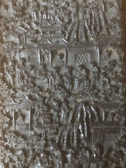 A stained wood cigarette case with carved...