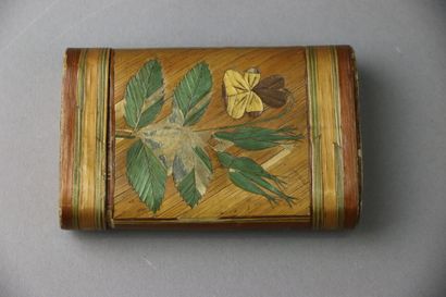 An oblong straw marquetry box with polychrome...