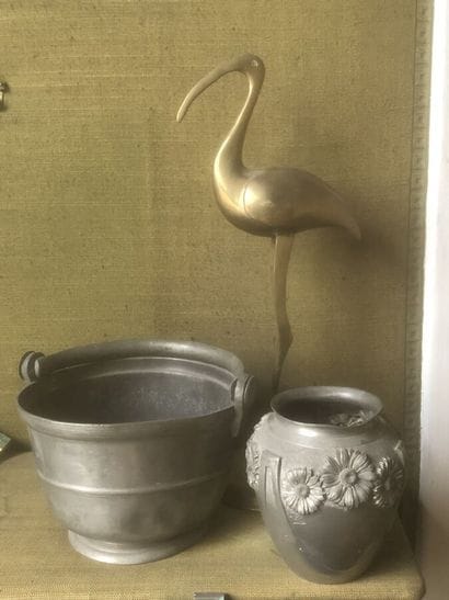 Set comprising: a pewter vase decorated with...