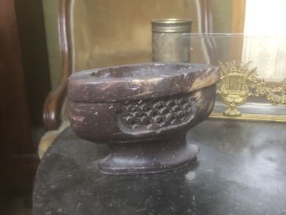 Scales, a brass socket, a glass and brass...