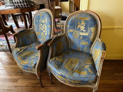 Pair of bergères in grey lacquered wood....