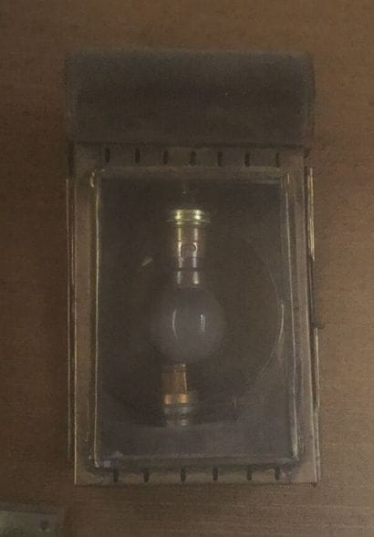 Brass sconce lantern.