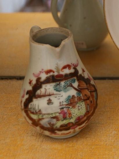 Porcelain milk jug with in-reserve decoration...