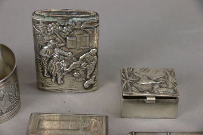 Set of silver display items including: pyrogen...